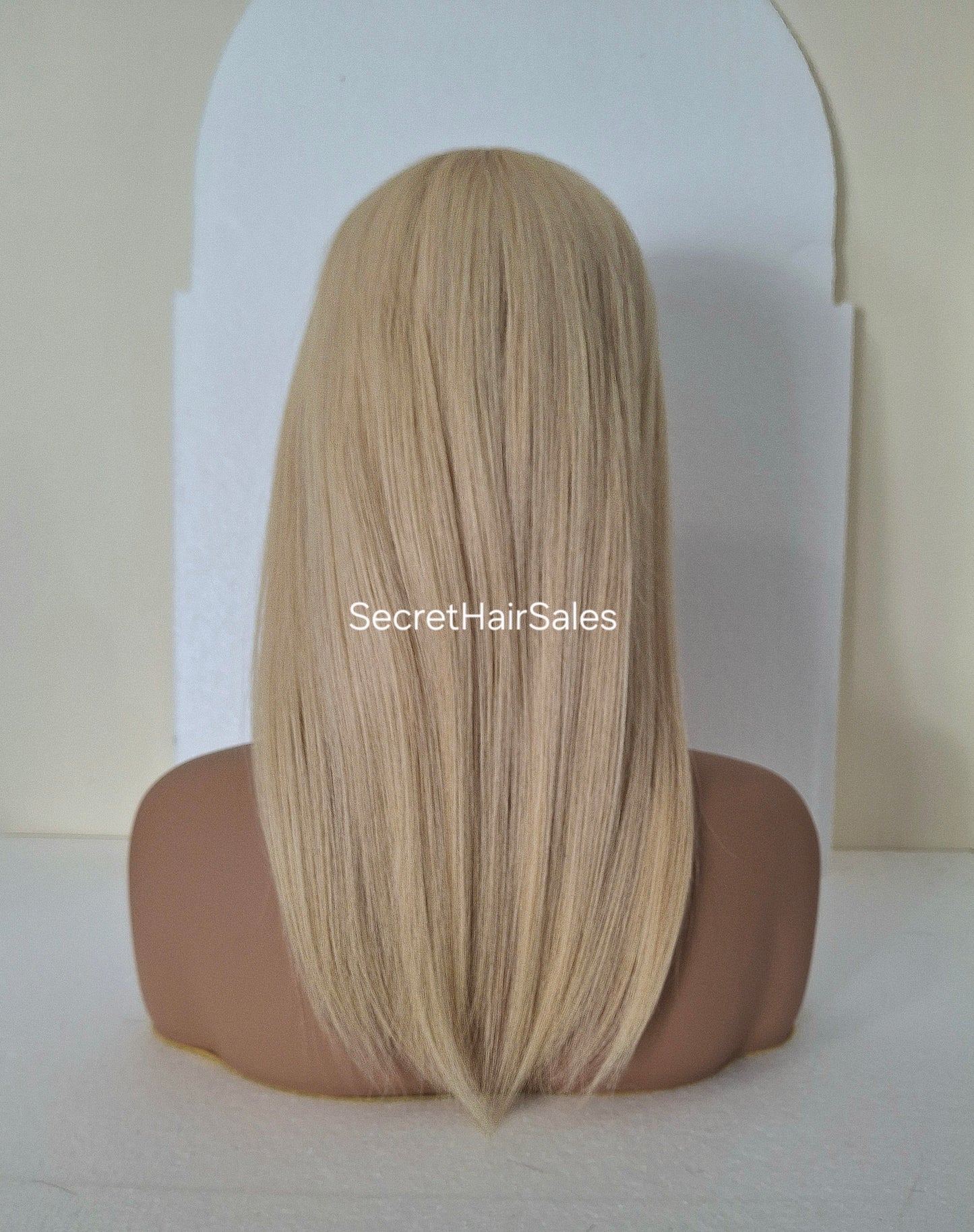 Bella lace front silk and weft base topper, 100% human hair, 6x7inch base, 16inches long, sunshine blonde